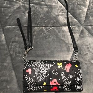 Disney wallet with straps.